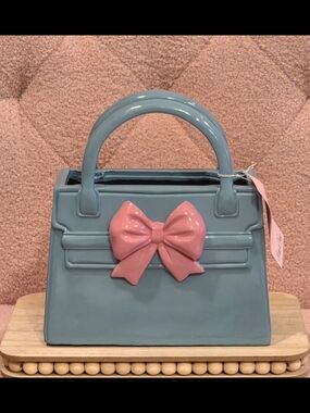 Blue Handbag with Pink Bow Accent Vase